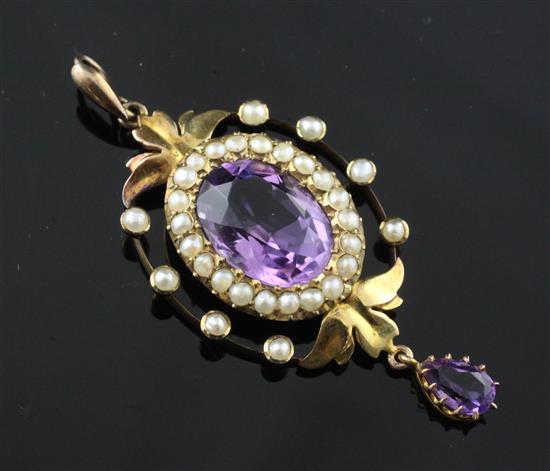 A late Victorian 15ct gold, amethyst and seed pearl drop pendant, 2in.